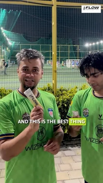 Football players at the Namma Bengaluru League holding Flow electrolyte sachets